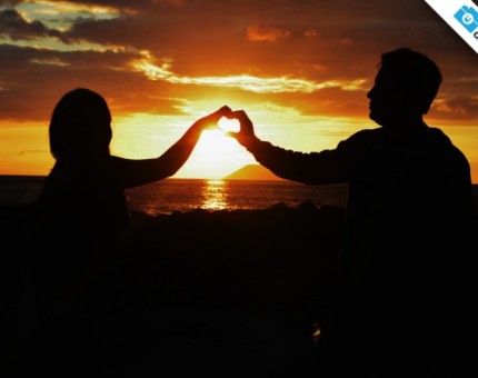 Galapagos Photo Sharing an awesome moment with your partner in Seymour Island